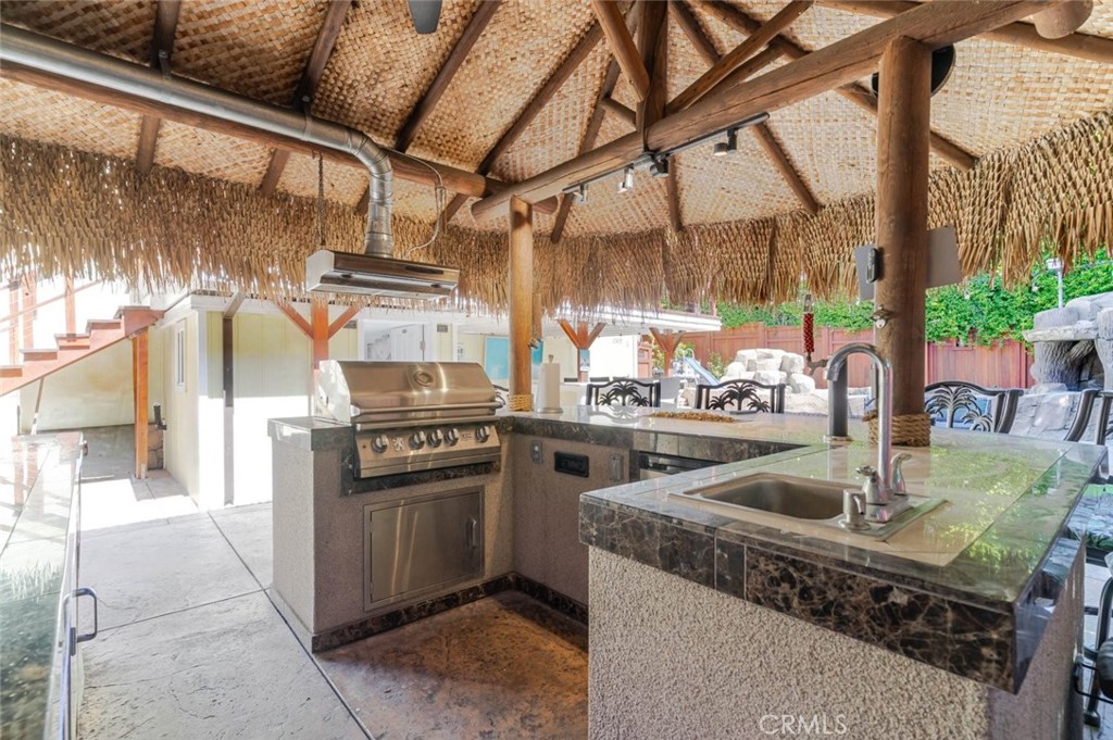 660 Woodbury Road Glendale, CA 91206 - Photo 27 of 45 a kitchen with a stove and a sink