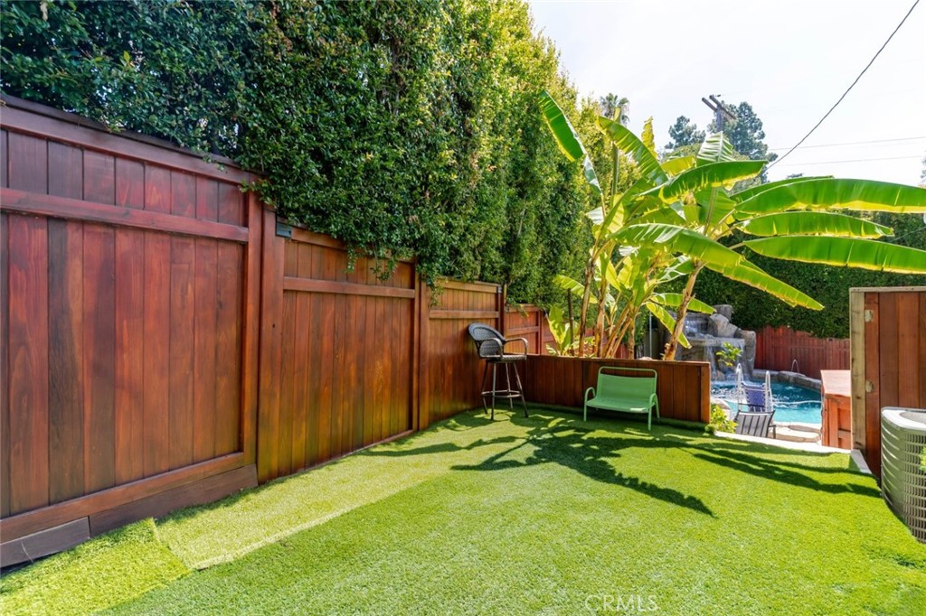 660 Woodbury Road Glendale, CA 91206 - Photo 39 of 45 a view of a backyard with a garden