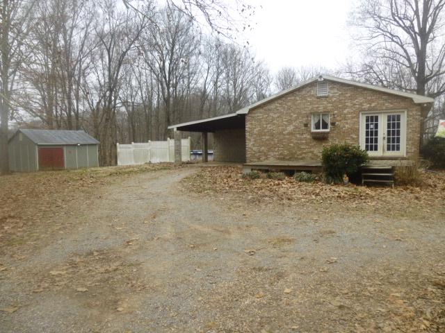 490 Powell Hollow Road Tullahoma, TN 37388 - Photo 2 of 10 This home sits on over 18 acres and large storage building