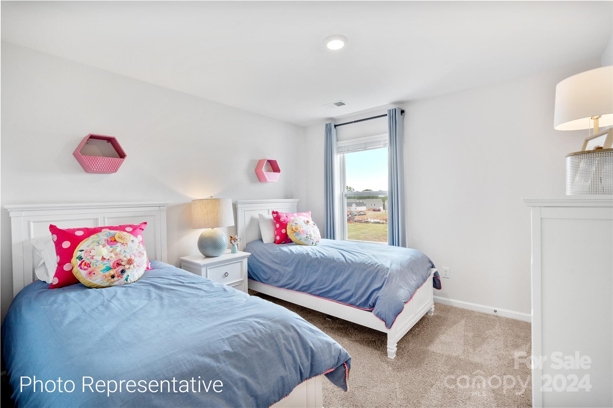 244 Wheatfield Road Fletcher, NC 28732 - Photo 26 of 29 a bedroom with a bed and window