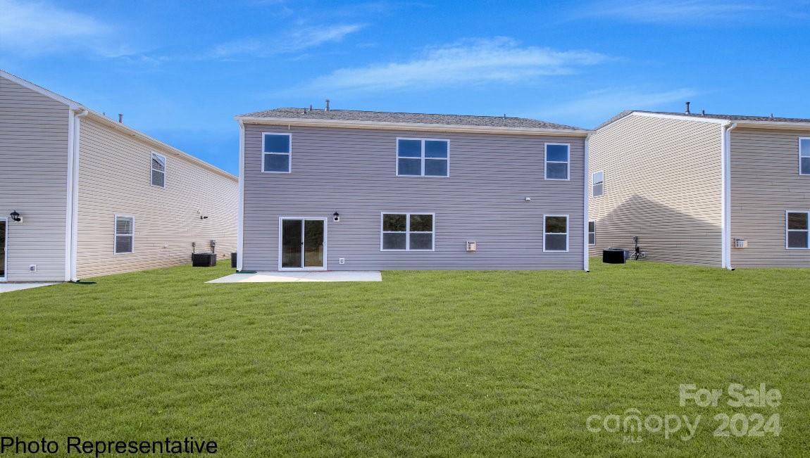 244 Wheatfield Road Fletcher, NC 28732 - Photo 29 of 29 a backyard of a house with lots of green space