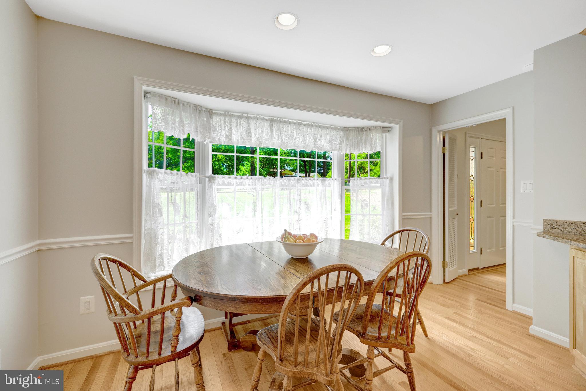 2042 Carrhill Road Vienna, VA 22181 - Photo 24 of 80 a view of a dining room with furniture window and outside view
