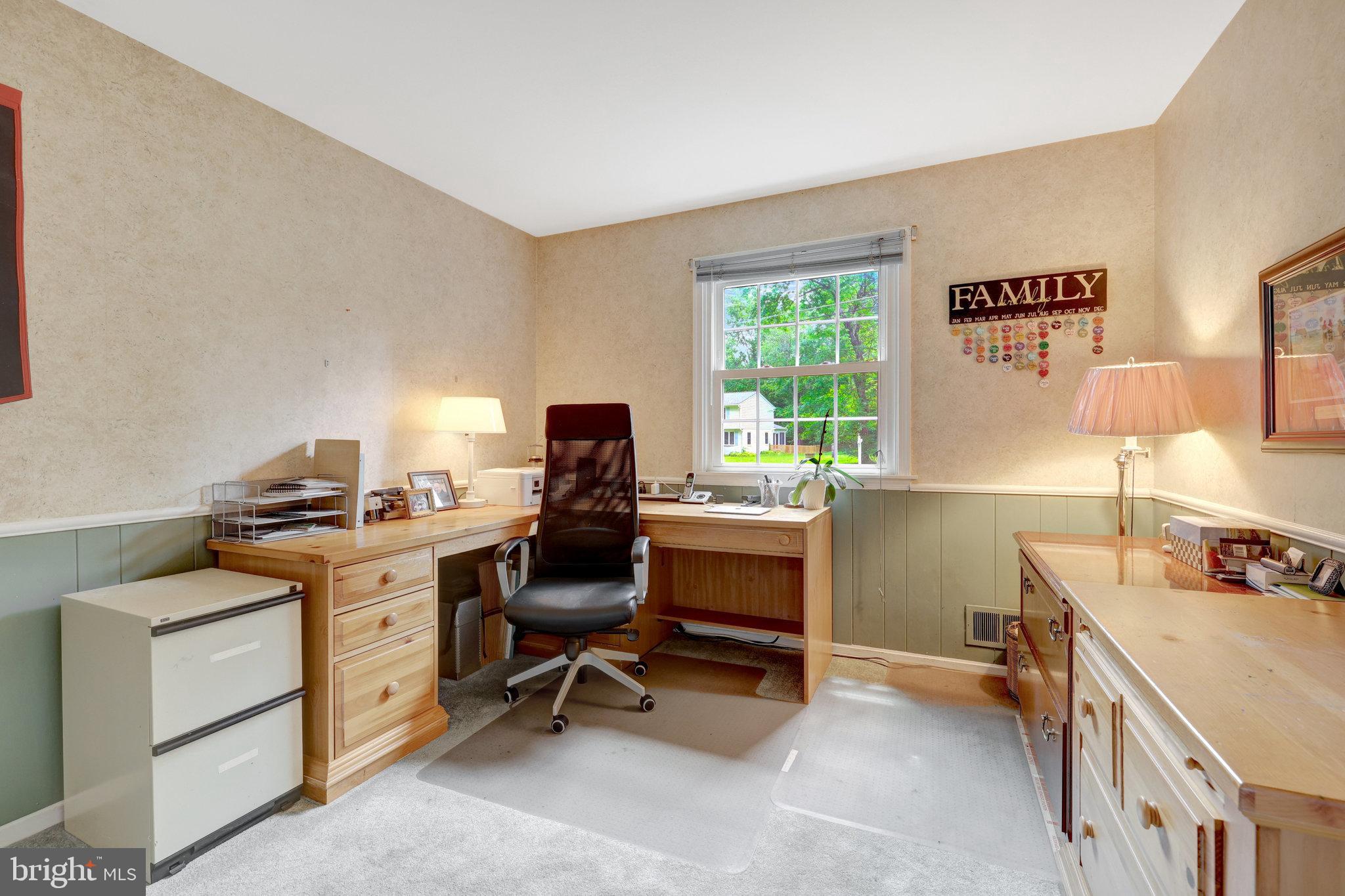 2042 Carrhill Road Vienna, VA 22181 - Photo 42 of 80 a view of a workspace with furniture and a window