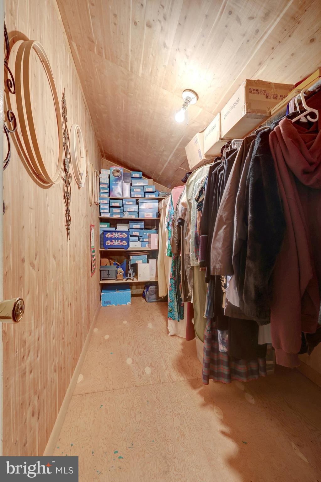 2042 Carrhill Road Vienna, VA 22181 - Photo 59 of 80 a view of walk in closet with clothes and shoes