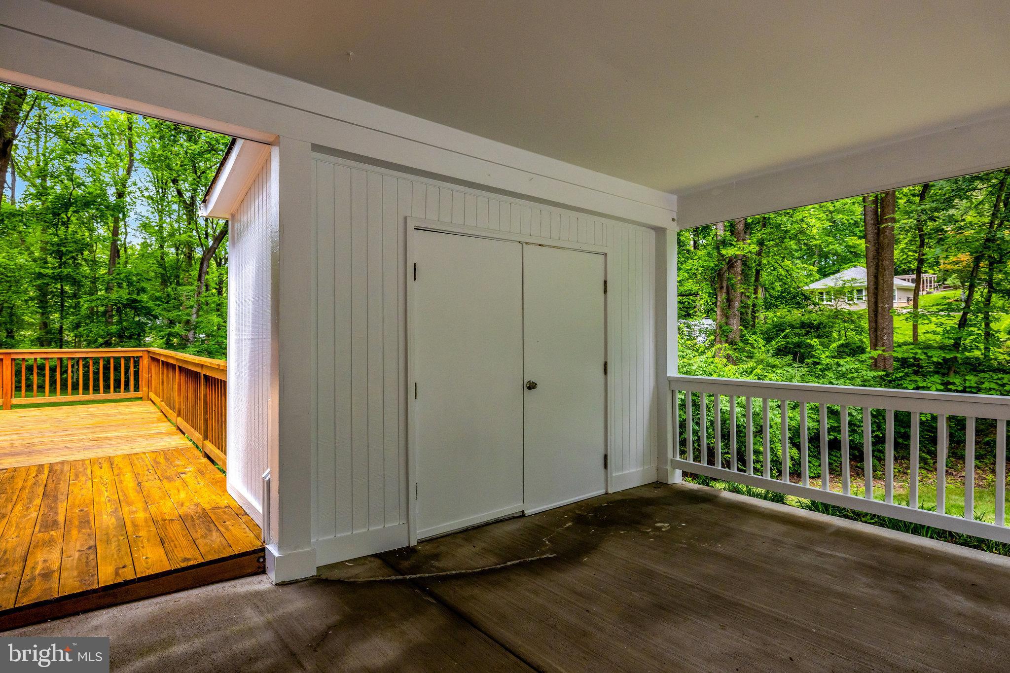 2042 Carrhill Road Vienna, VA 22181 - Photo 63 of 80 a view of a balcony with wooden floor