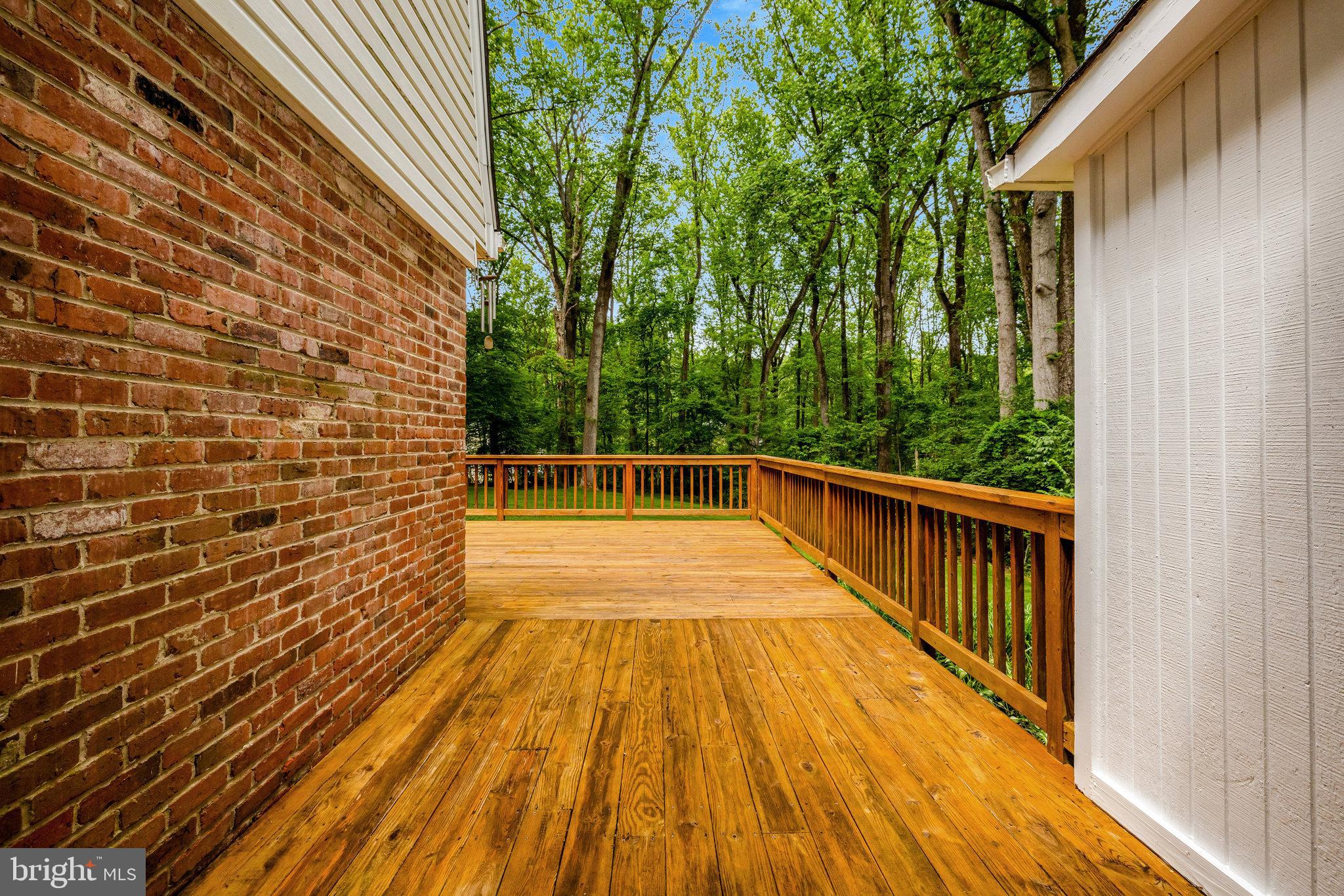 2042 Carrhill Road Vienna, VA 22181 - Photo 64 of 80 a view of balcony with wooden floor and fence