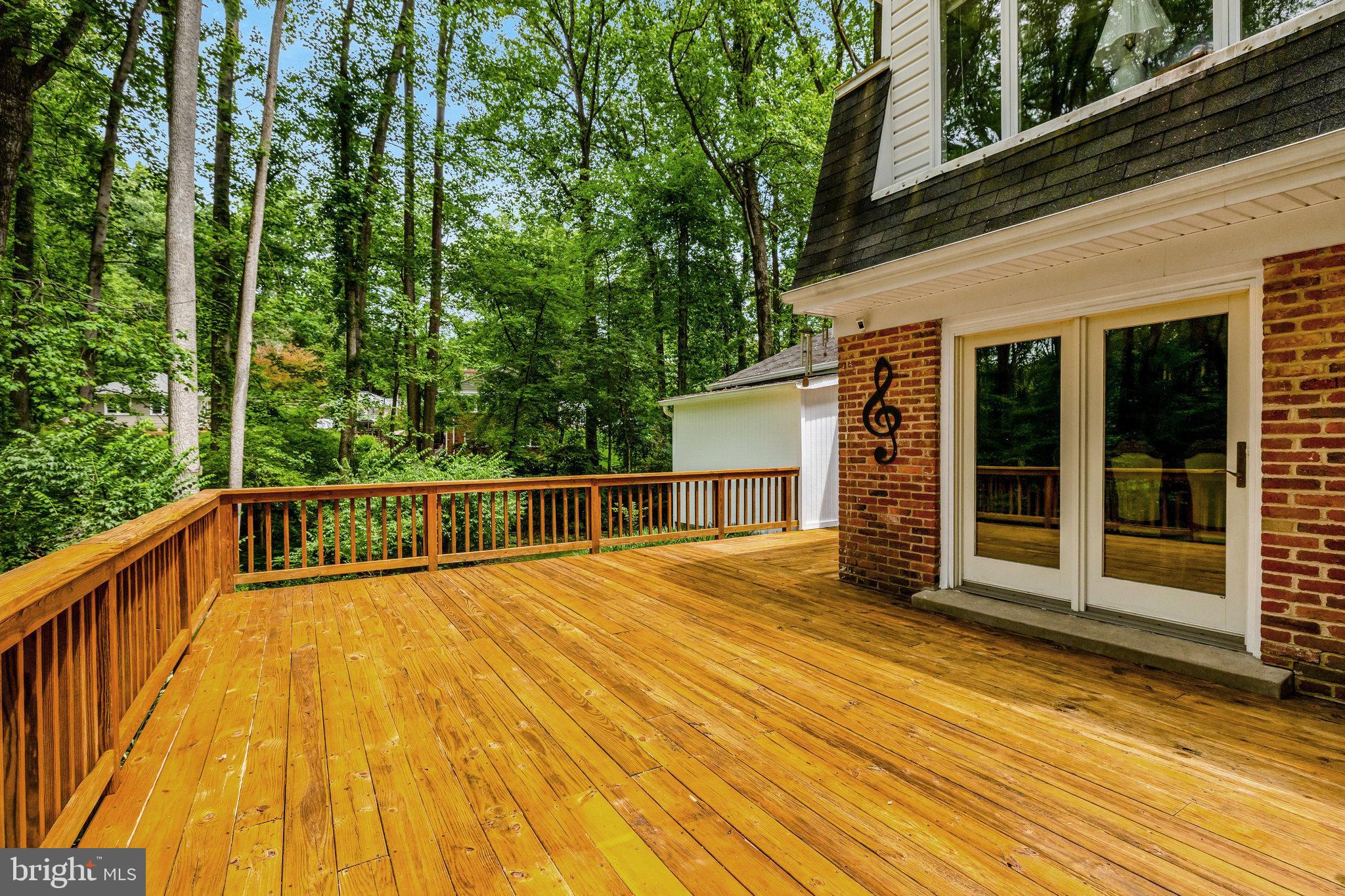 2042 Carrhill Road Vienna, VA 22181 - Photo 68 of 80 a view of a balcony with wooden floor and fence