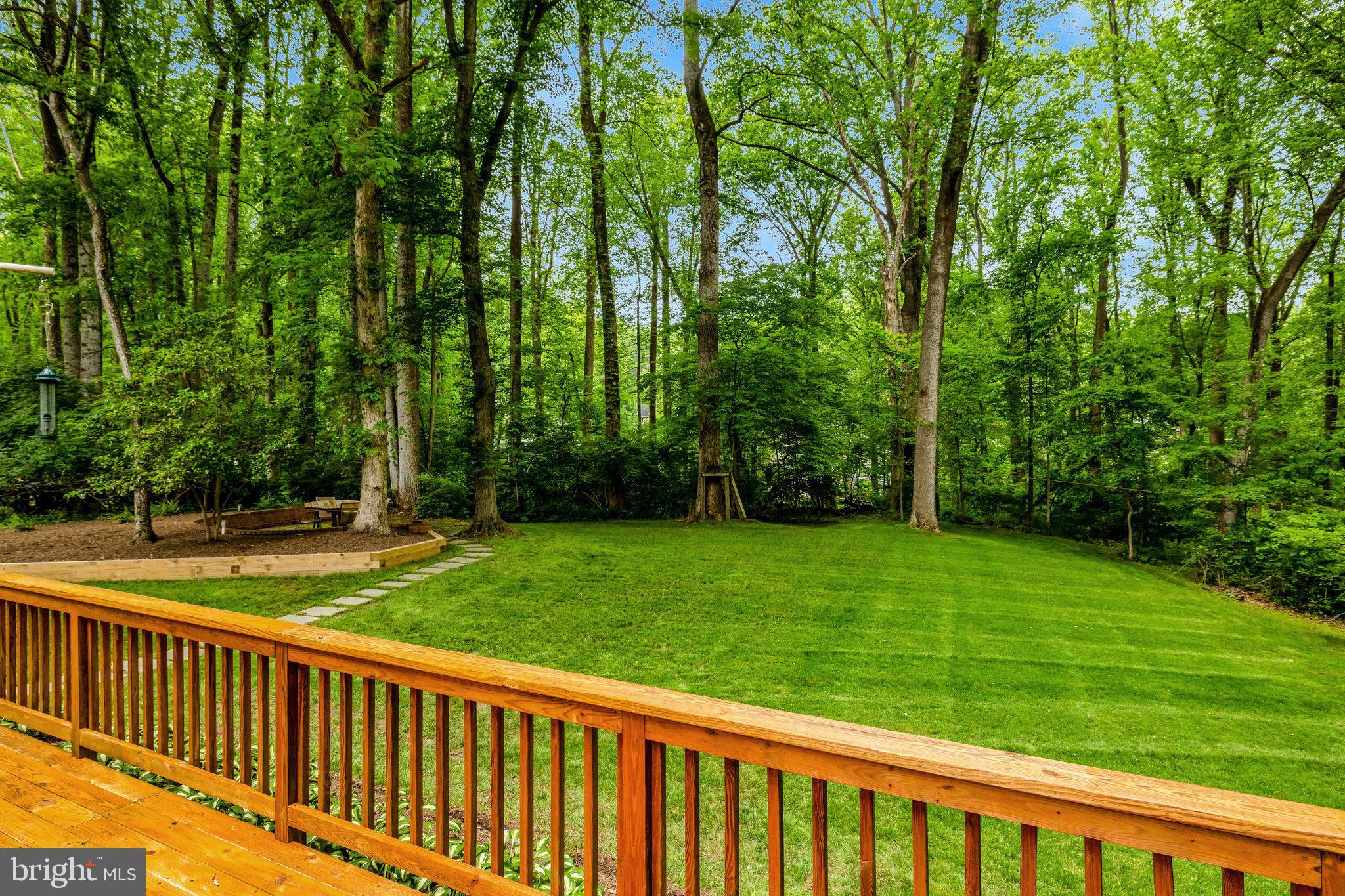 2042 Carrhill Road Vienna, VA 22181 - Photo 69 of 80 a view of a backyard with a wooden fence