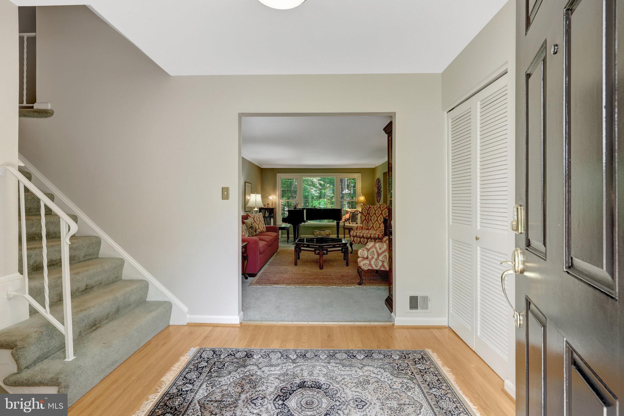 2042 Carrhill Road Vienna, VA 22181 - Photo 8 of 80 a view of a hallway with furniture and a rug