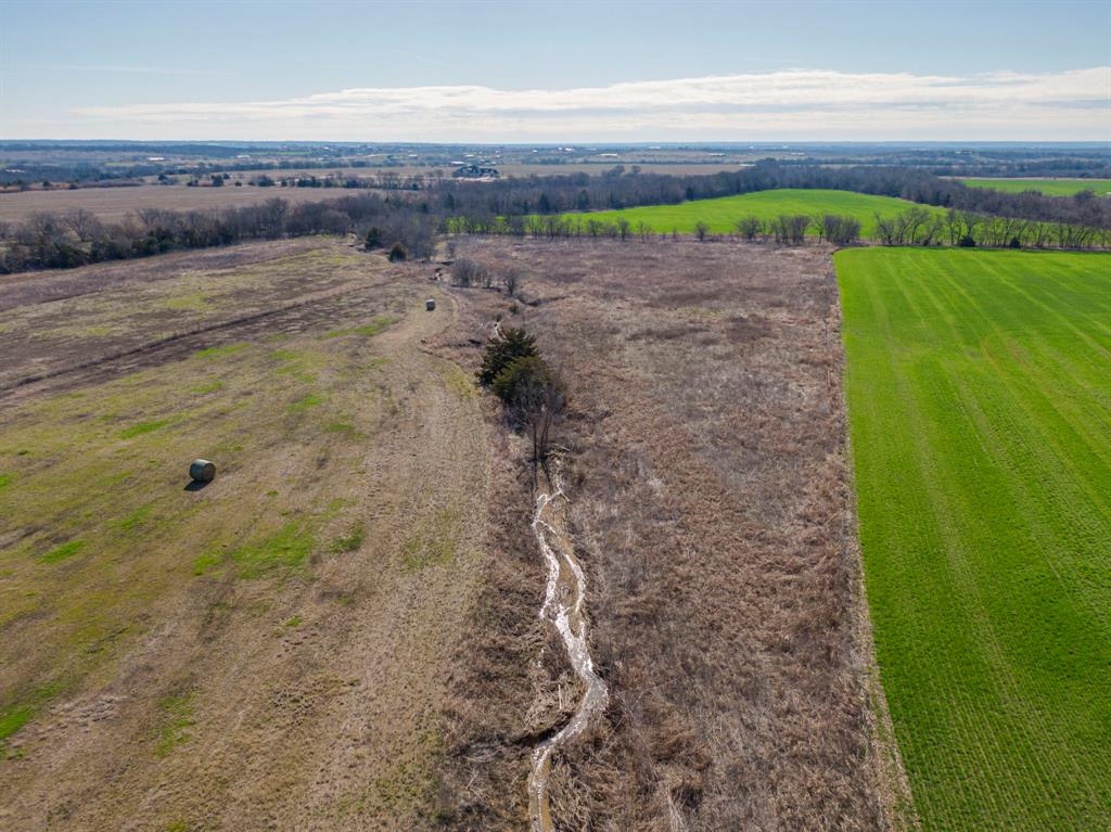 0 Ozro Road Venus, TX 76084 - Photo 17 of 18 a view of a pathway both side of yard