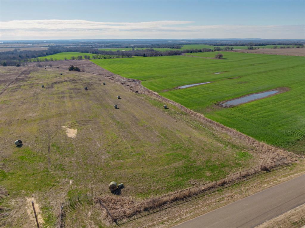 0 Ozro Road Venus, TX 76084 - Photo 9 of 18 a view of a field with an empty space