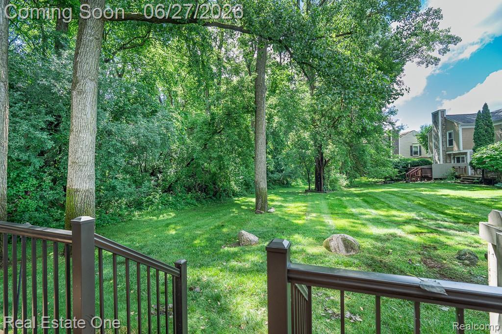 1222 Kings Cove Court, Unit 244 Rochester, MI 48306 - Photo 42 of 44 Enjoy peaceful private views while relaxing on your deck