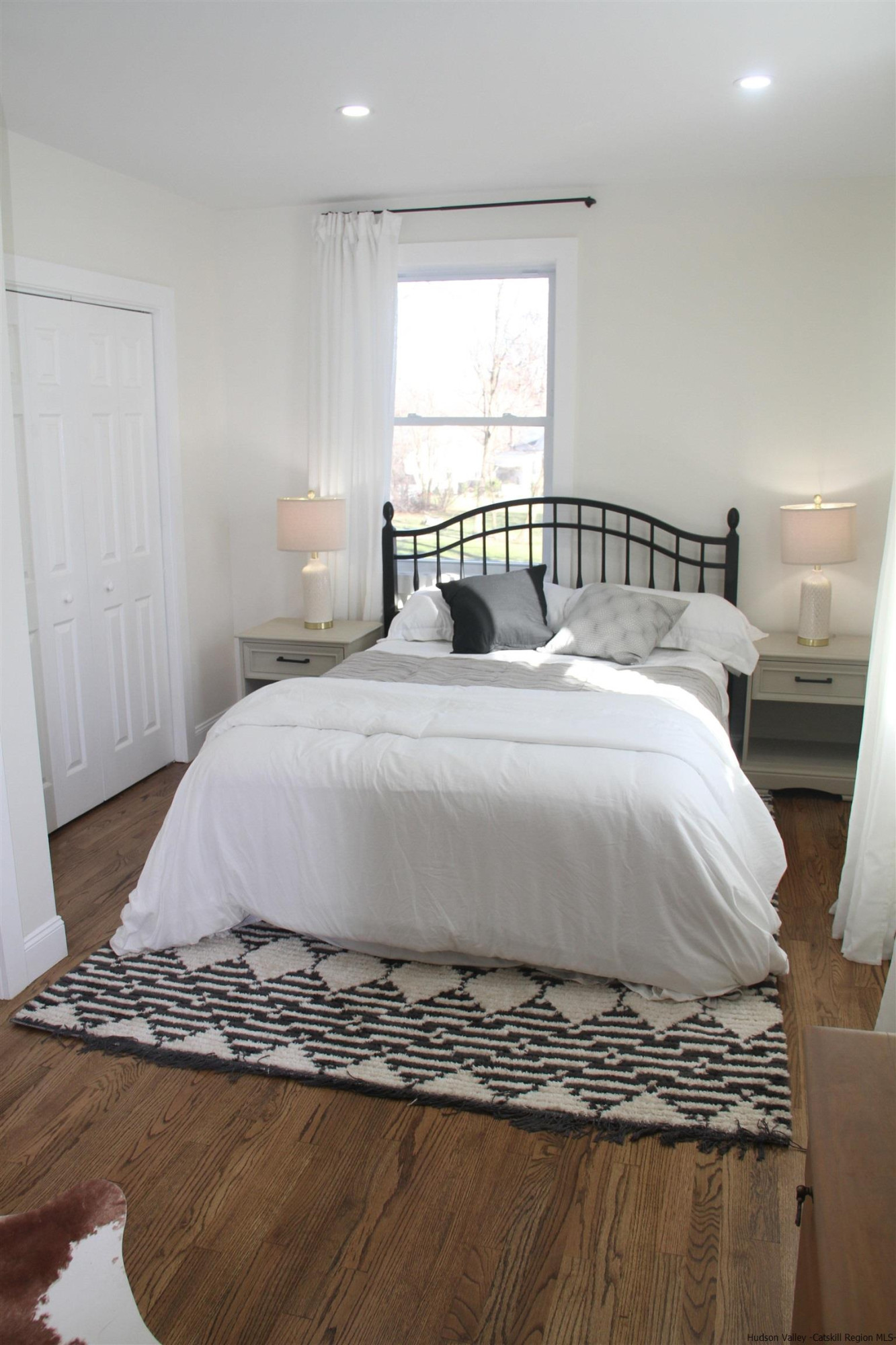 246 Jefferson Heights Catskill, NY 12414 - Photo 18 of 35 a bedroom with a bed and window