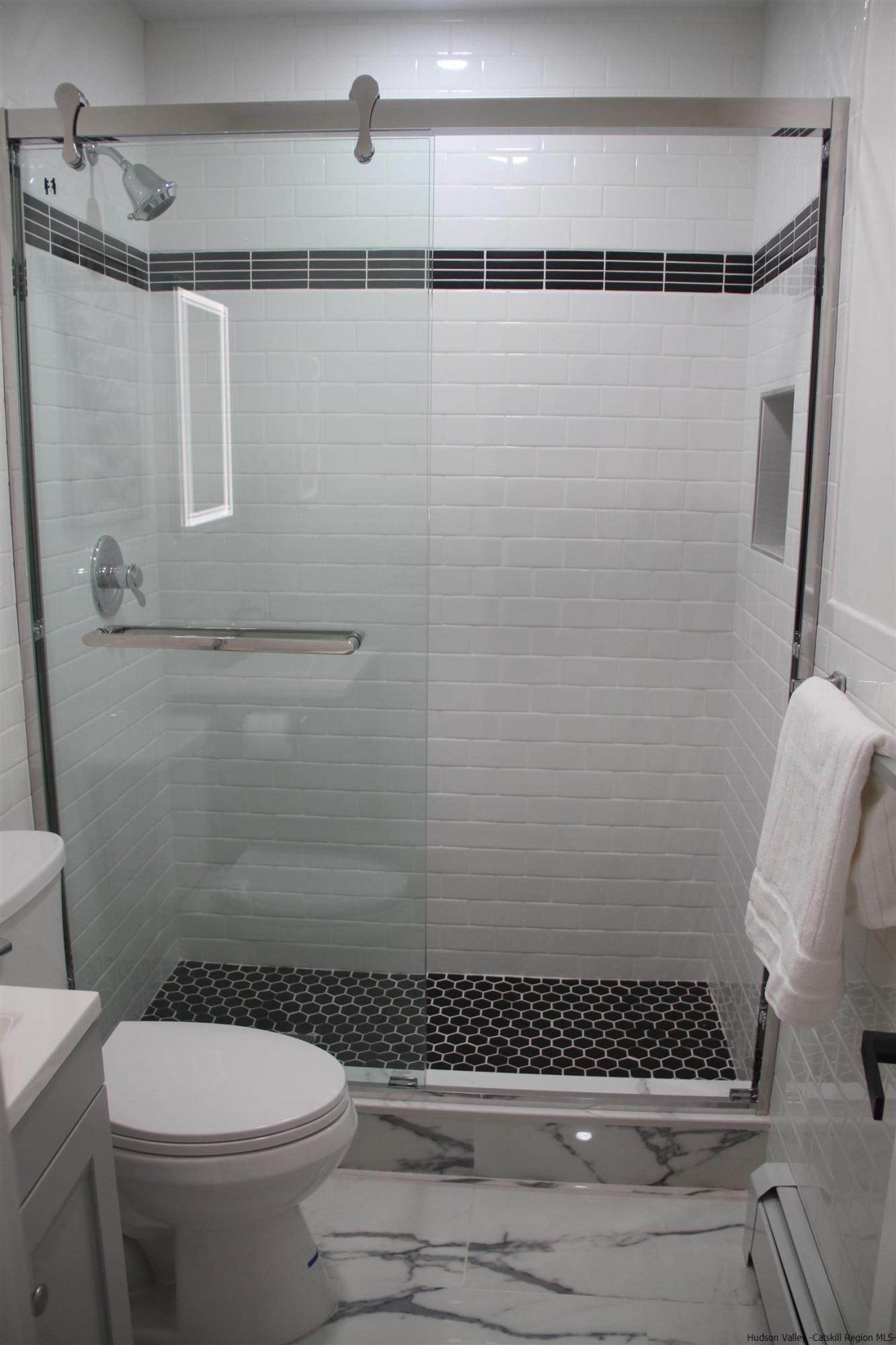 246 Jefferson Heights Catskill, NY 12414 - Photo 20 of 35 a bathroom with a shower a toilet and a window