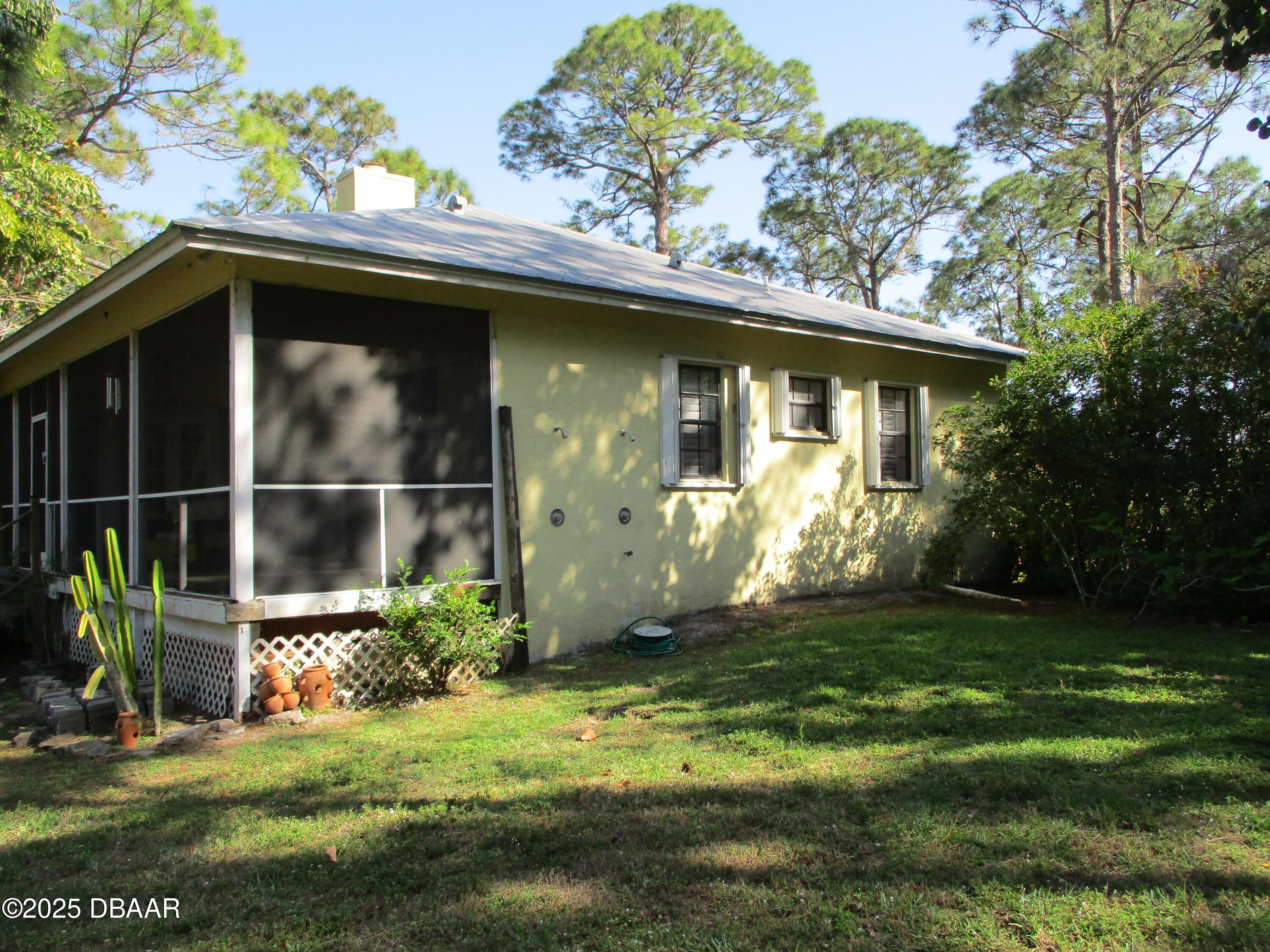 10681 154th Road North Jupiter, FL 33478 - Photo 7 of 17 a view of a house with a yard