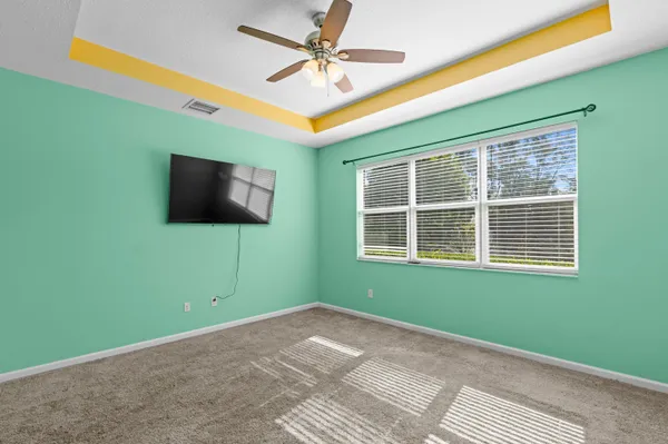 a view of a livingroom with a flat screen tv