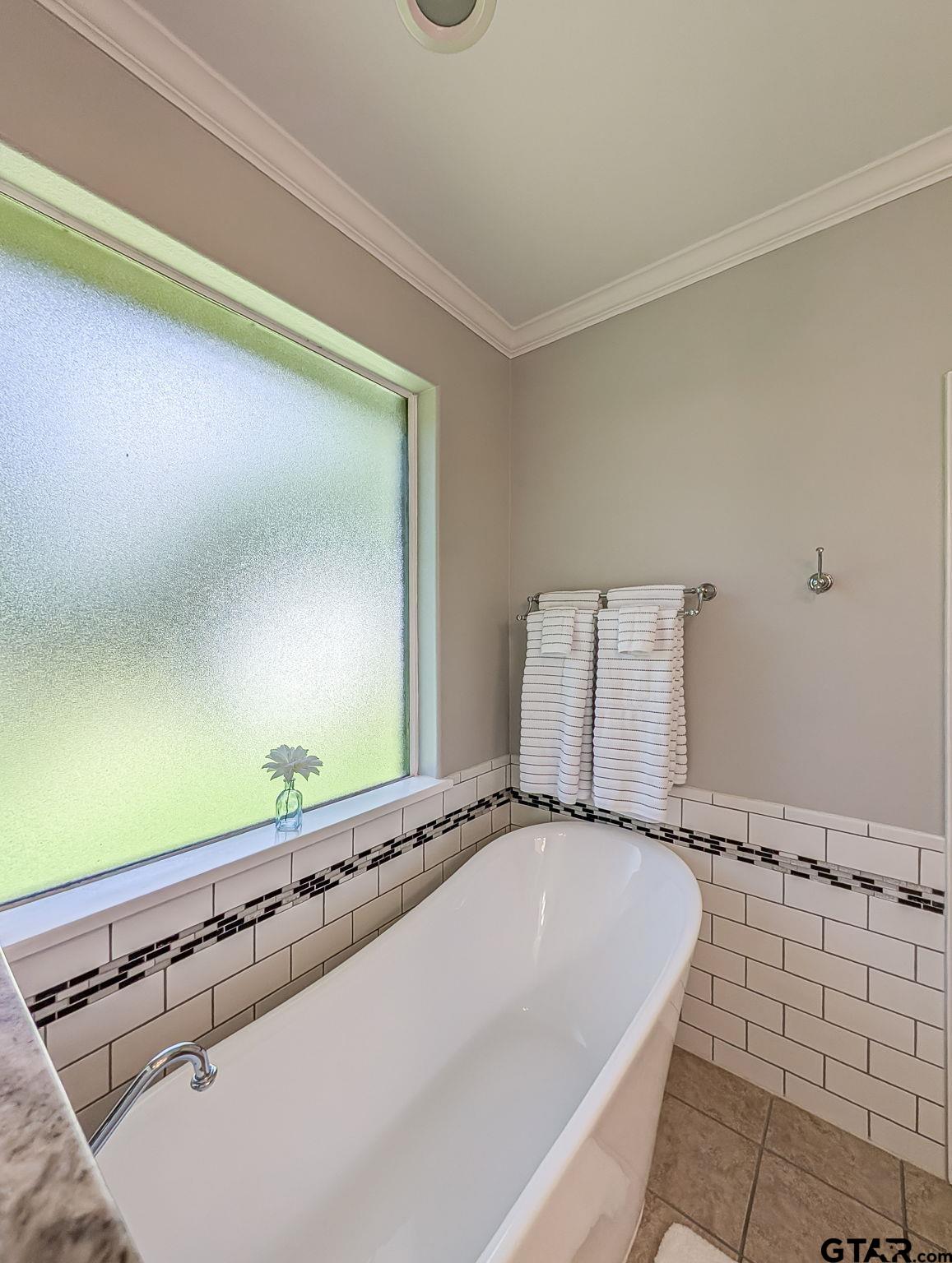 18488 Bluebird Circle Flint, TX 75762 - Photo 23 of 47 a bathroom with a bathtub and a sink