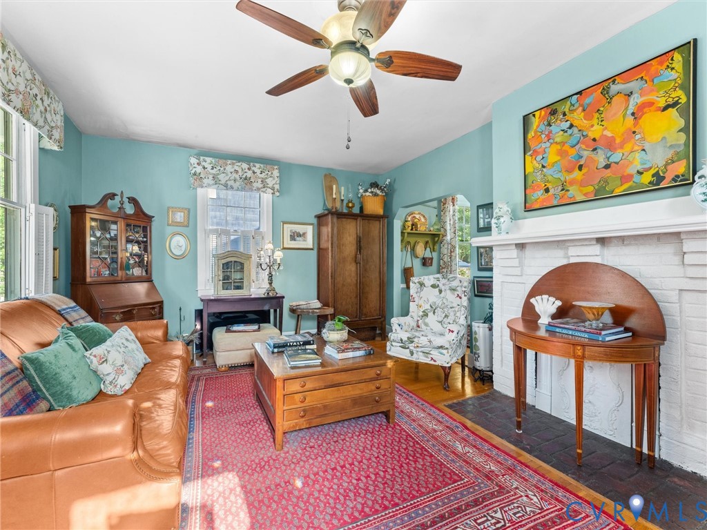 1812 Seddon Road Richmond, VA 23227 - Photo 7 of 56 Living area featuring a white brick fireplace with