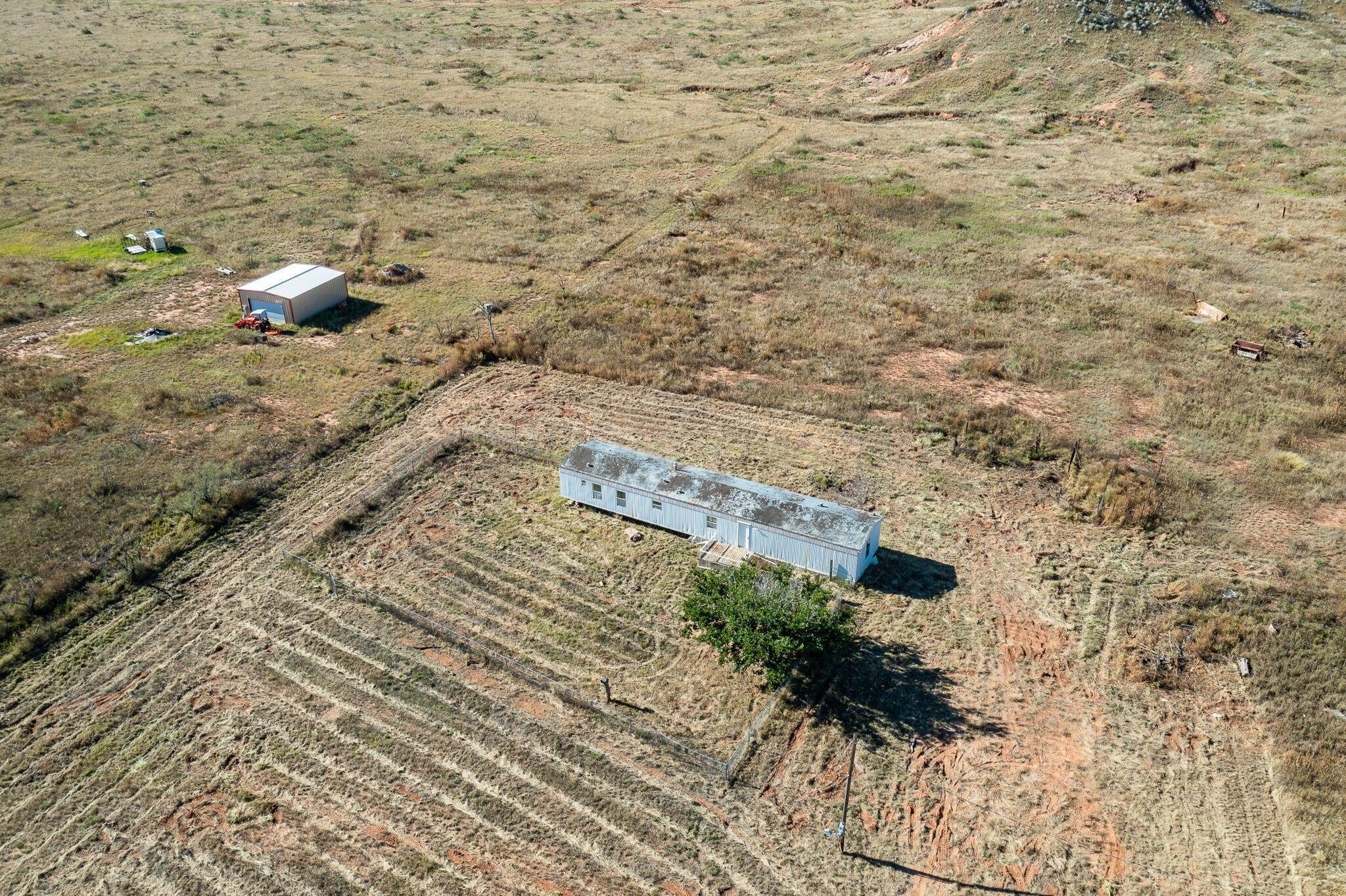 1061 Tascosa Road Amarillo, TX 79124 - Photo 28 of 31 a view of a pathway with a yard