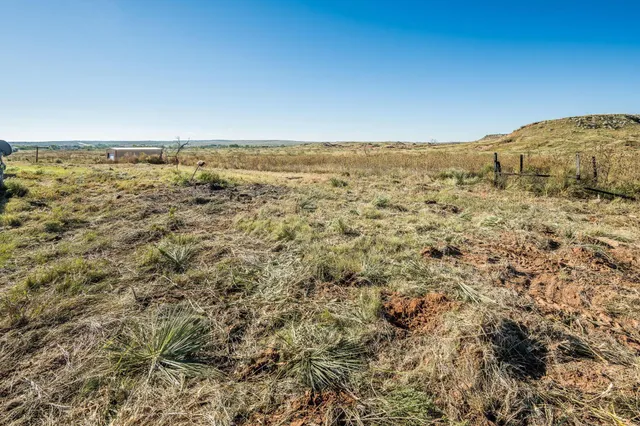 an aerial view of house with beach