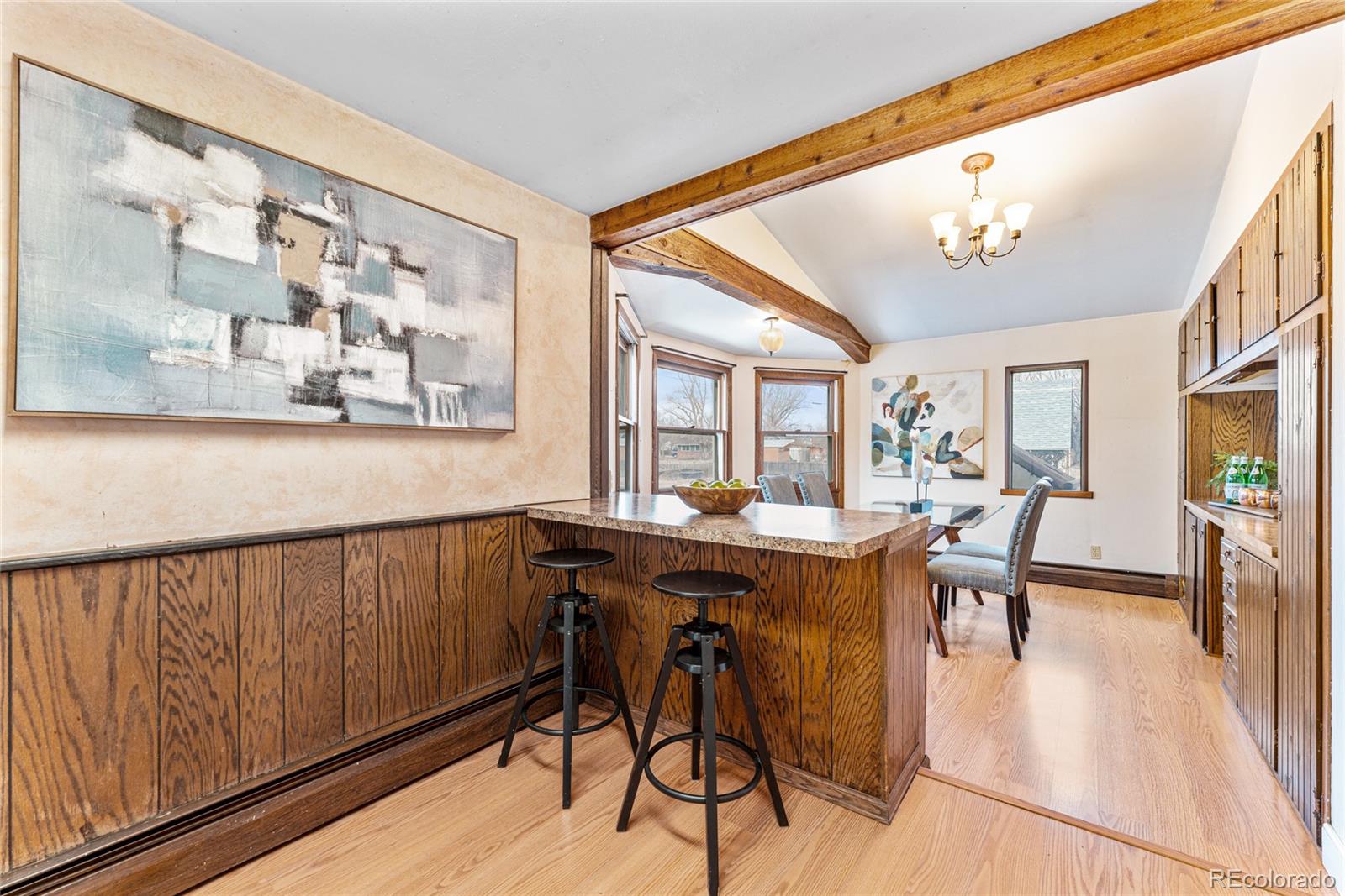3152 Indian Road Boulder, CO 80301 - Photo 16 of 49 a view of a dining room with furniture and wooden floor
