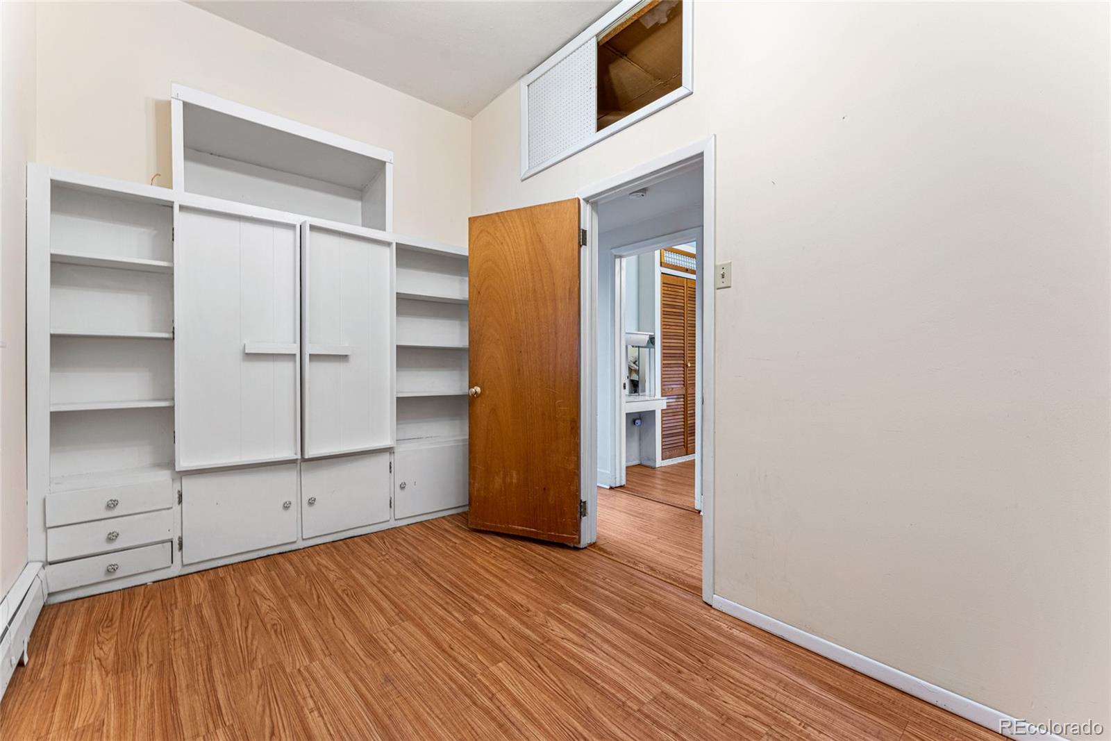 3152 Indian Road Boulder, CO 80301 - Photo 23 of 49 a view of an empty room with closet and wooden floor