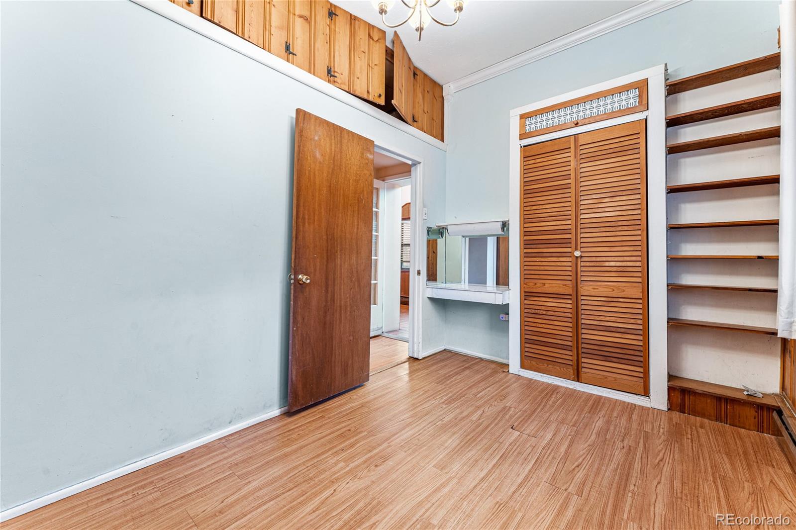 3152 Indian Road Boulder, CO 80301 - Photo 25 of 49 a view of empty room with wooden floor and fan