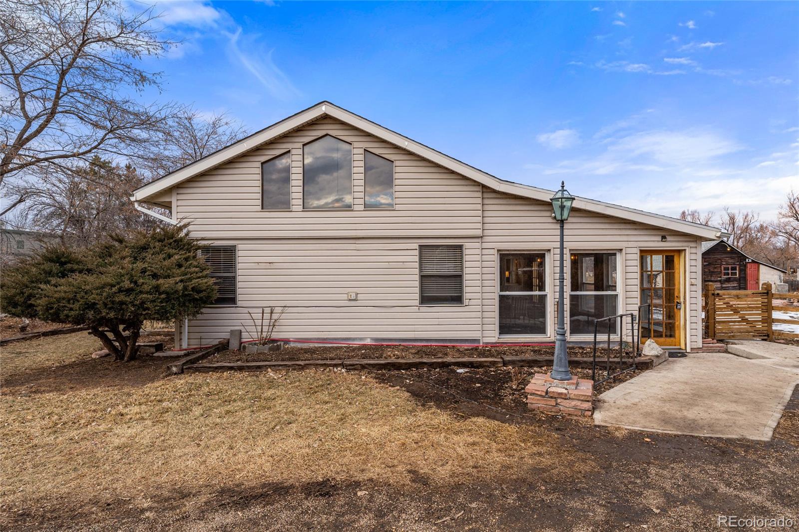 3152 Indian Road Boulder, CO 80301 - Photo 30 of 49 a front view of a house with yard