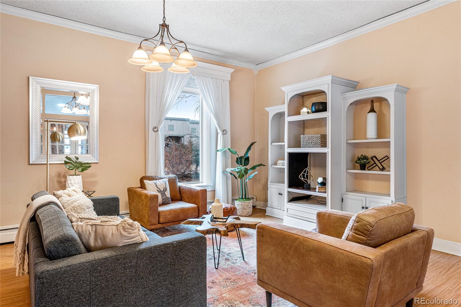 3152 Indian Road Boulder, CO 80301 - Photo 7 of 49 a living room with furniture fireplace and a large window