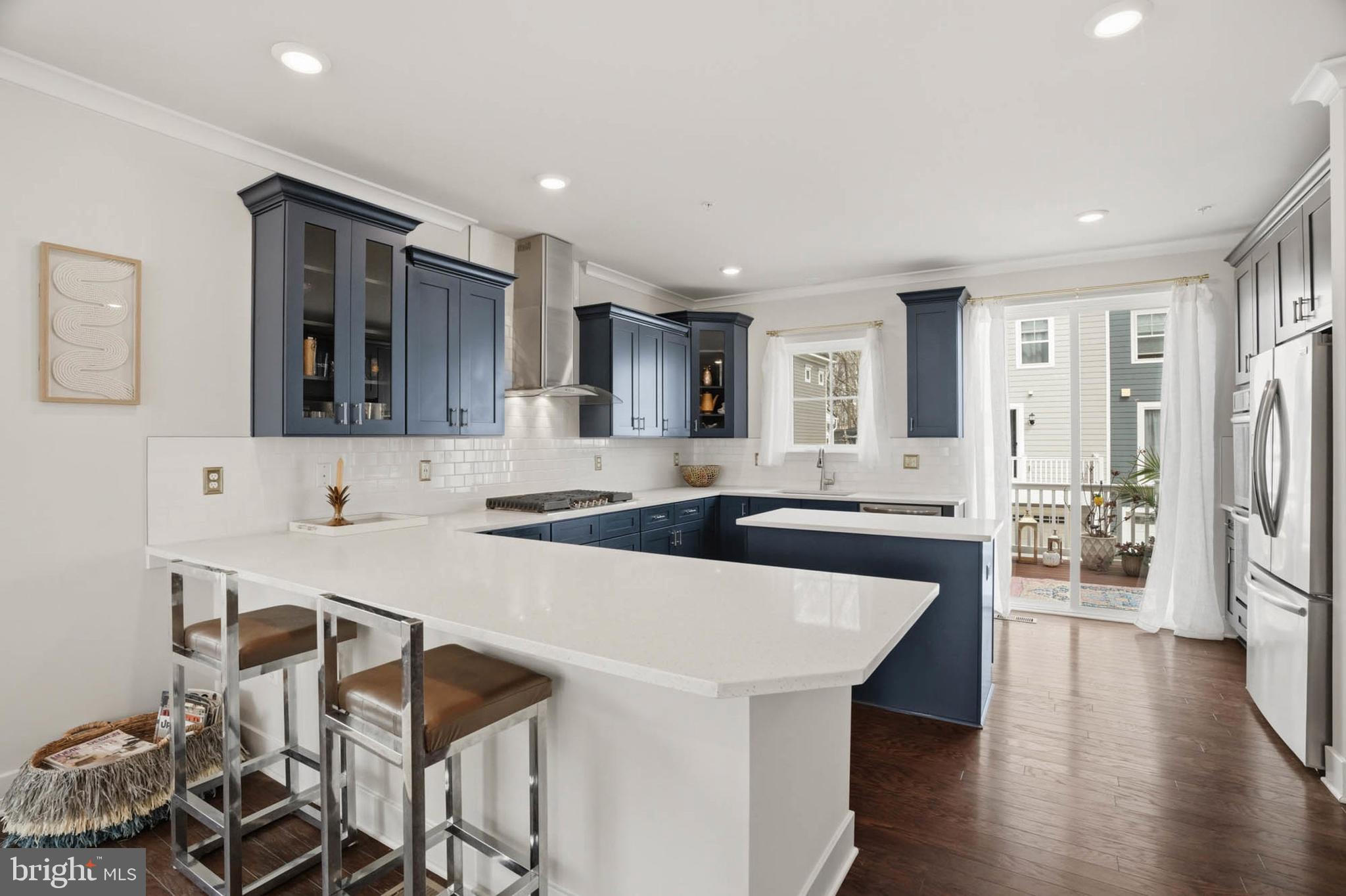 110 Bonny Way Annapolis, MD 21403 - Photo 13 of 35 a large kitchen with a table and chairs