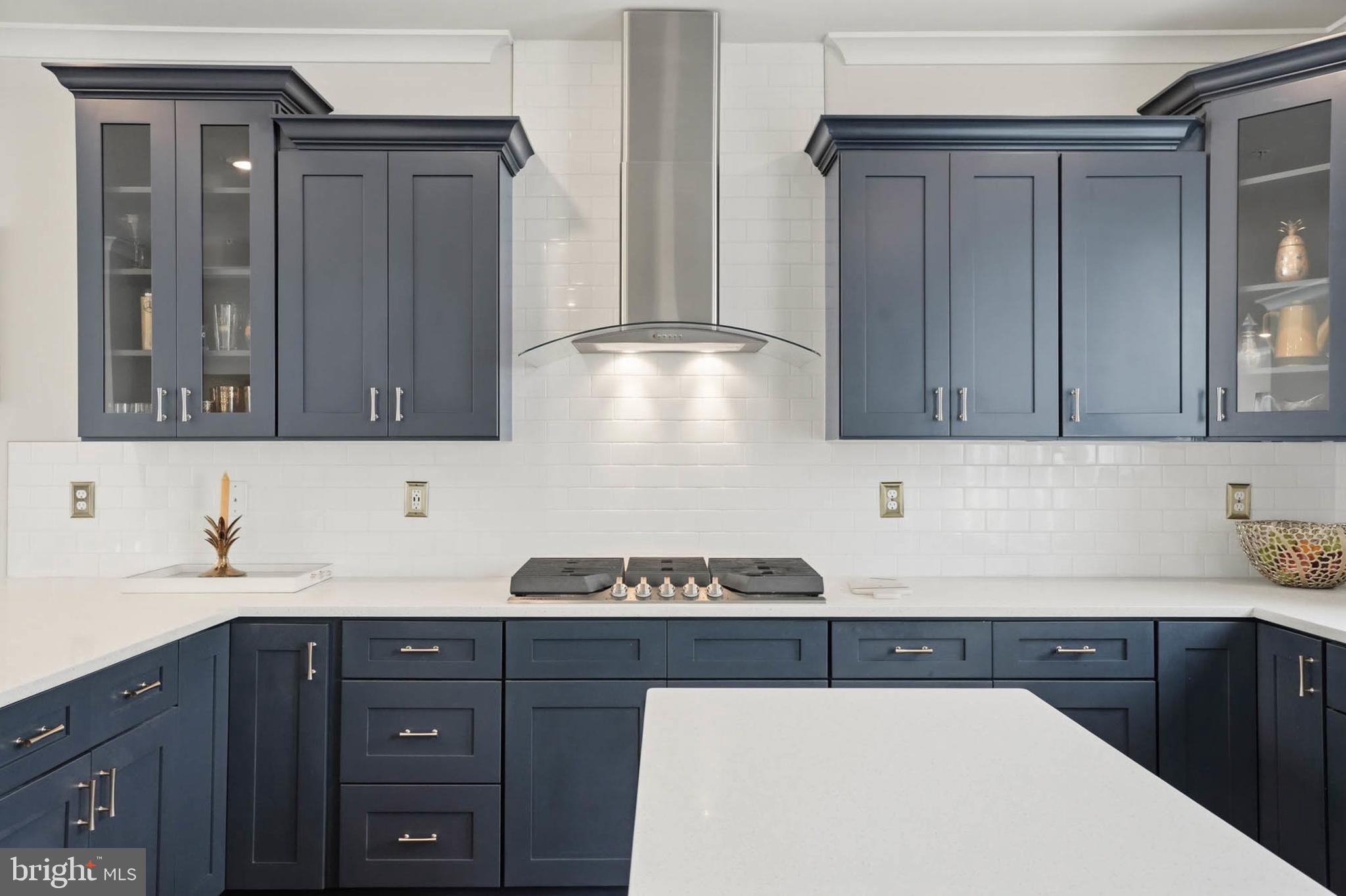 110 Bonny Way Annapolis, MD 21403 - Photo 15 of 35 a kitchen with a sink a stove and cabinets