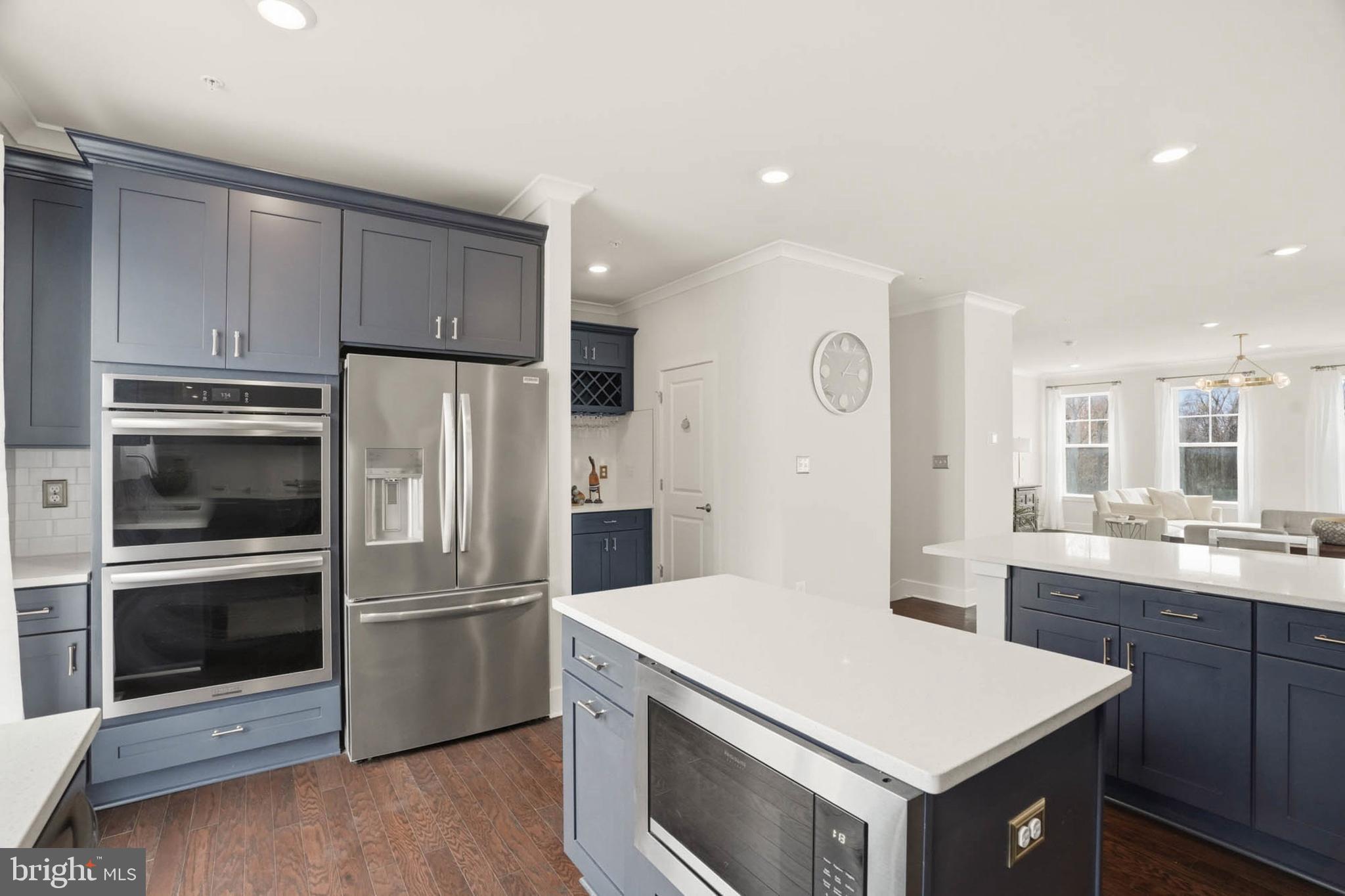 110 Bonny Way Annapolis, MD 21403 - Photo 17 of 35 a kitchen with a sink a microwave a refrigerator and cabinets