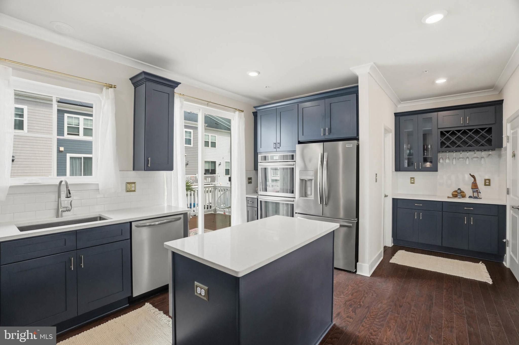 110 Bonny Way Annapolis, MD 21403 - Photo 18 of 35 a kitchen with a sink cabinets and refrigerator