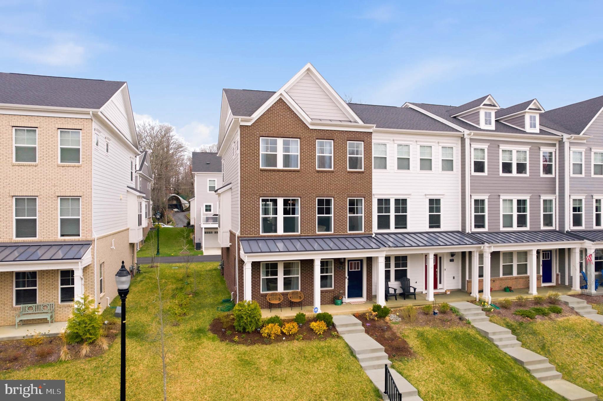 110 Bonny Way Annapolis, MD 21403 - Photo 2 of 35 a front view of a building with a garden