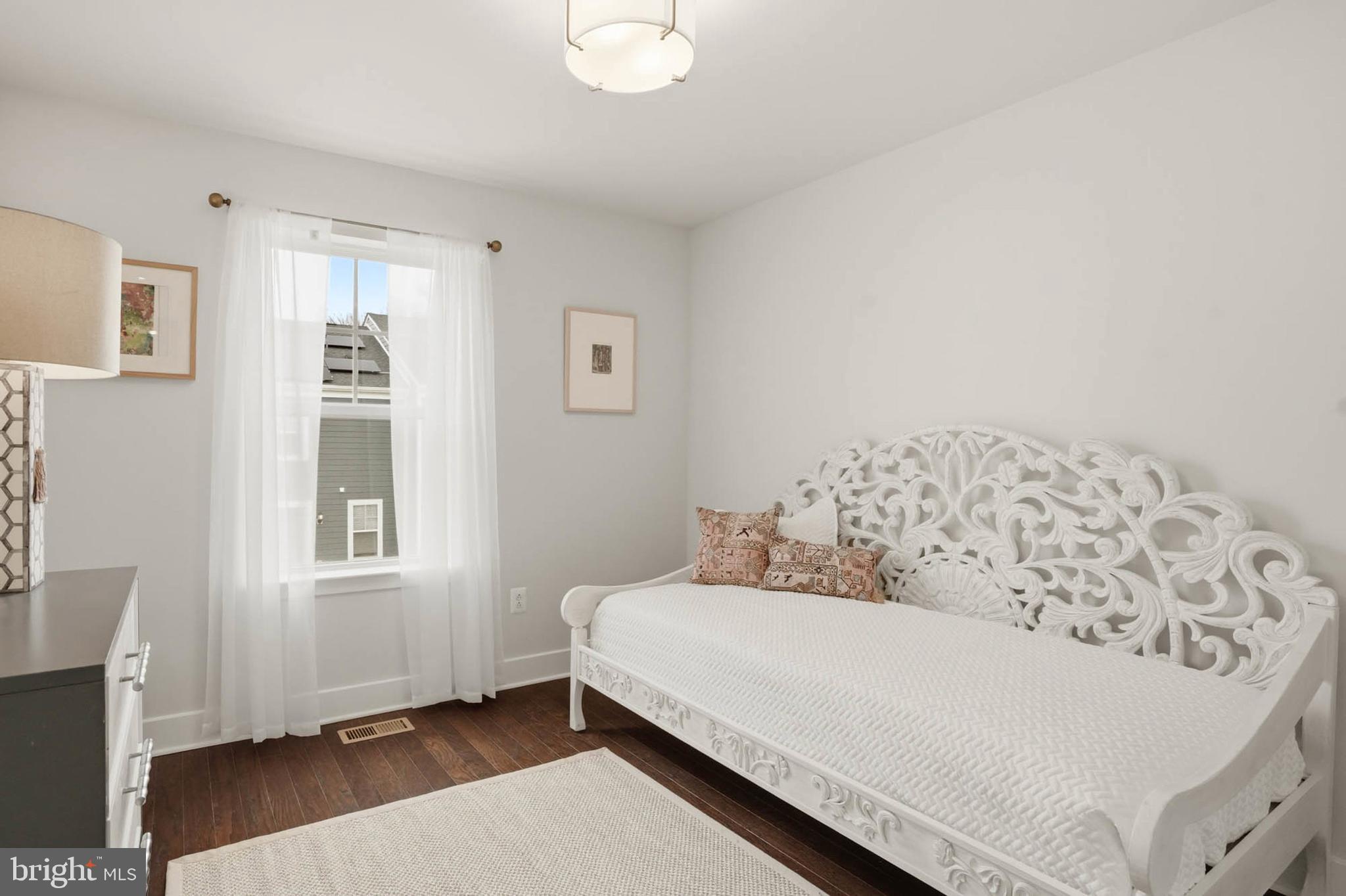 110 Bonny Way Annapolis, MD 21403 - Photo 26 of 35 a bedroom with a bed and wooden floor