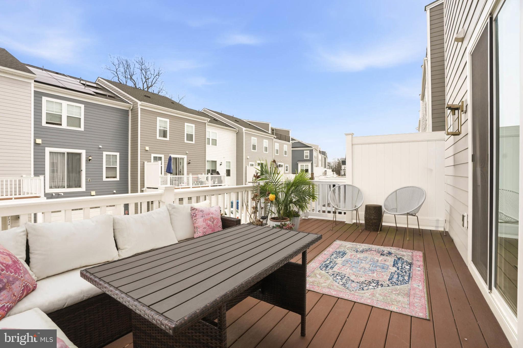 110 Bonny Way Annapolis, MD 21403 - Photo 31 of 35 a balcony with wooden floor and furniture