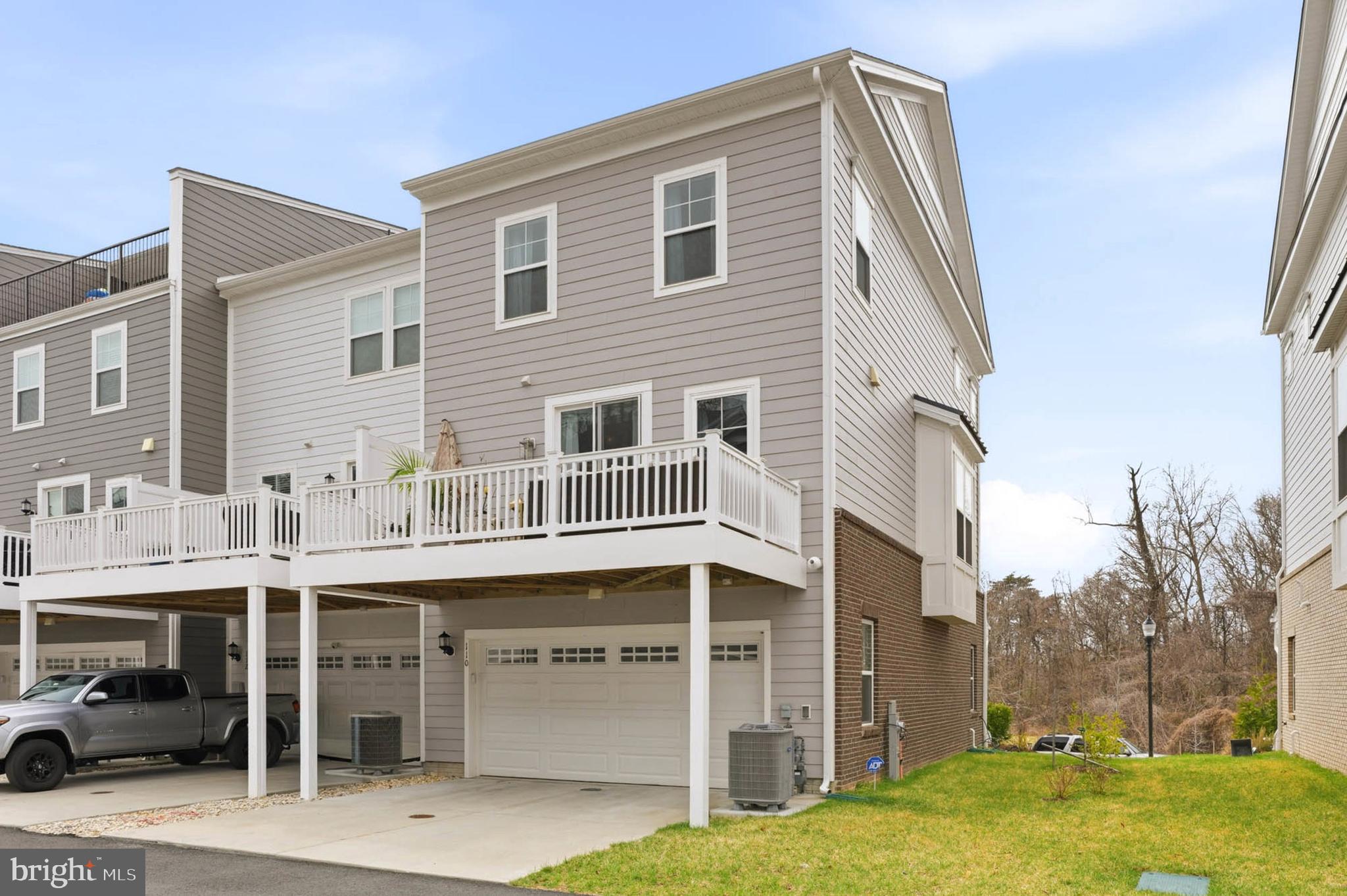 110 Bonny Way Annapolis, MD 21403 - Photo 32 of 35 a front view of a building with a yard
