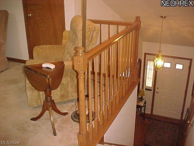 39284 Chestnut Ridge Road Elyria, OH 44035 - Photo 15 of 21 Staircase looking down to front entry.