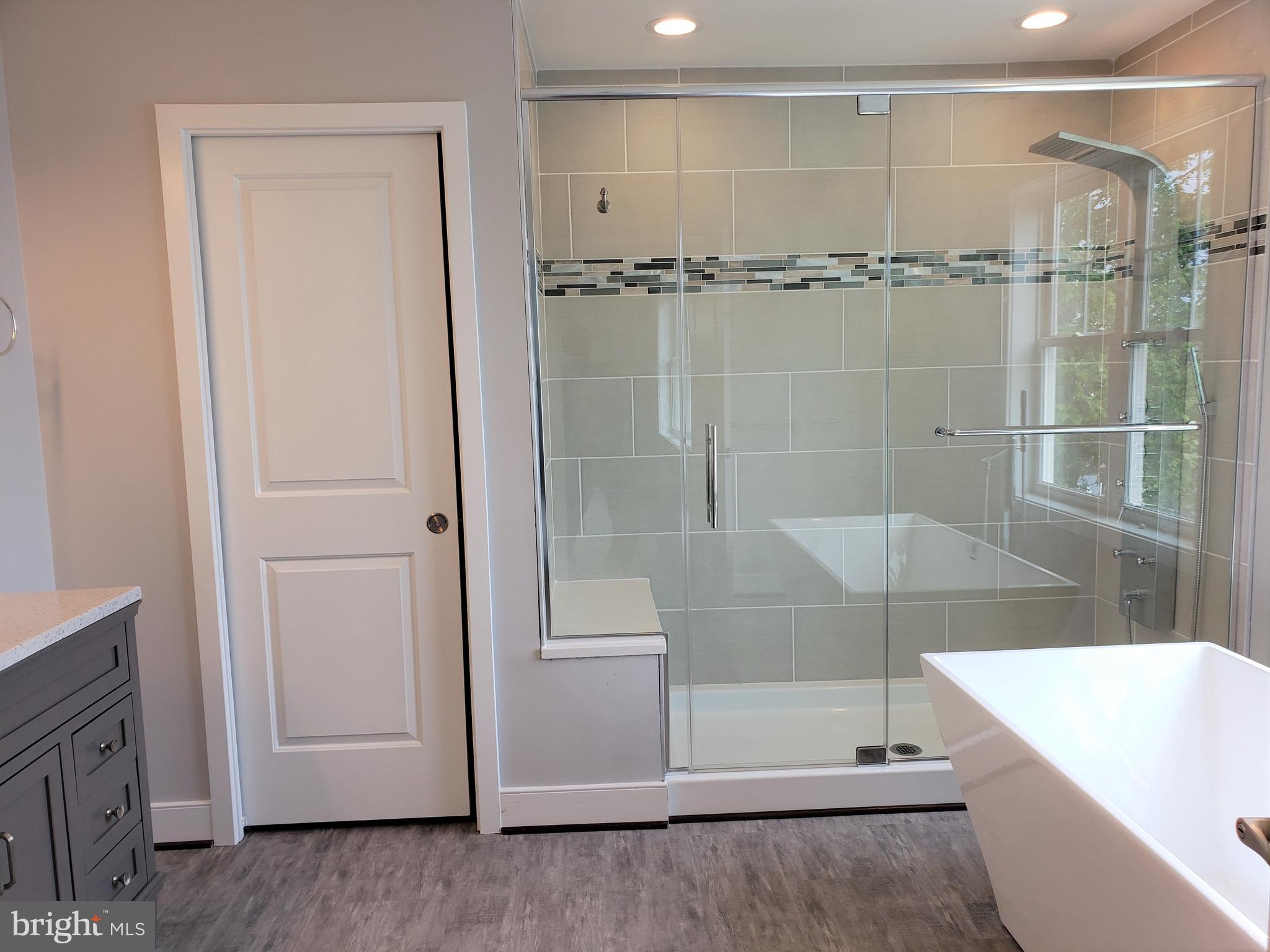 8204 Northview Road Baltimore, MD 21222 - Photo 22 of 43 Master Bath with Rainfall, Handheld & 8 Body Jets