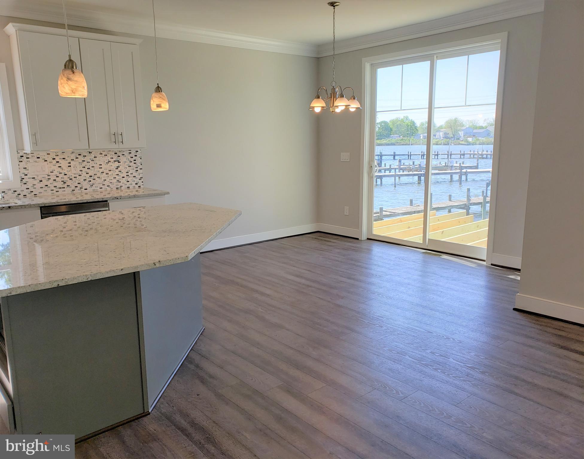 8204 Northview Road Baltimore, MD 21222 - Photo 8 of 43 Breakfast Bar and Dining Area from Family Room