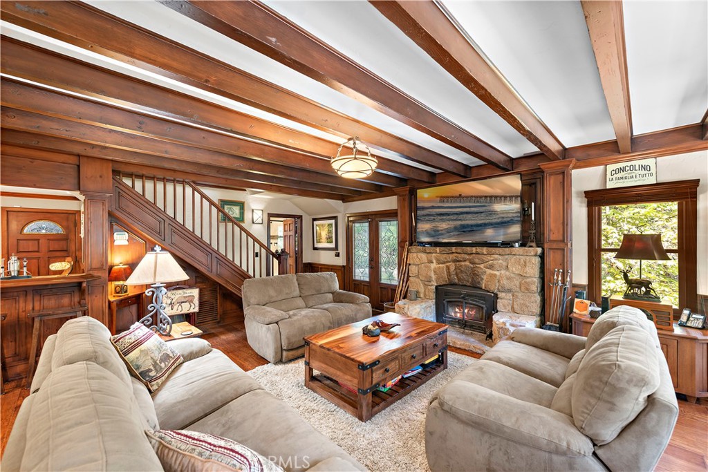 400 Cottage Grove Road Lake Arrowhead, CA 92352 - Photo 19 of 70 a living room with furniture fireplace and a large window