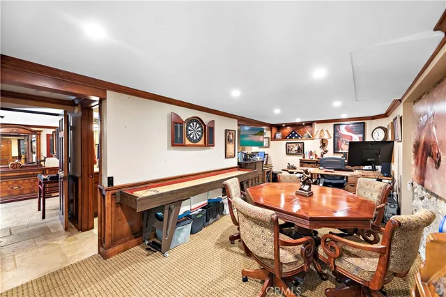 a view of balcony with furniture and wooden deck