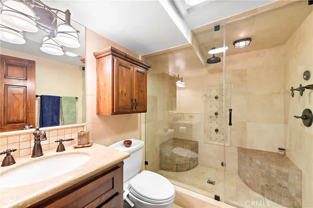 a view of a yard with plants and trees