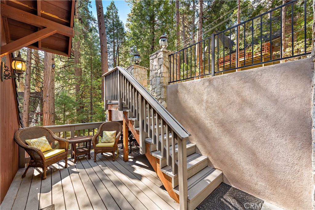 400 Cottage Grove Road Lake Arrowhead, CA 92352 - Photo 50 of 70 a view of balcony with furniture and wooden deck
