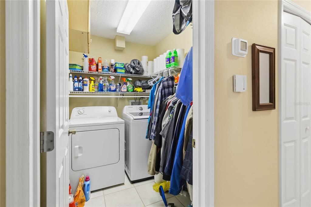 3225 Canoe Creek Road St. Cloud, FL 34772 - Photo 19 of 30 a utility room with dryer and washer