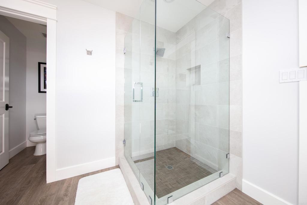 6145 La Flecha, Unit 4 Rancho Santa Fe, CA 92067 - Photo 15 of 26 a bathroom with a glass shower door