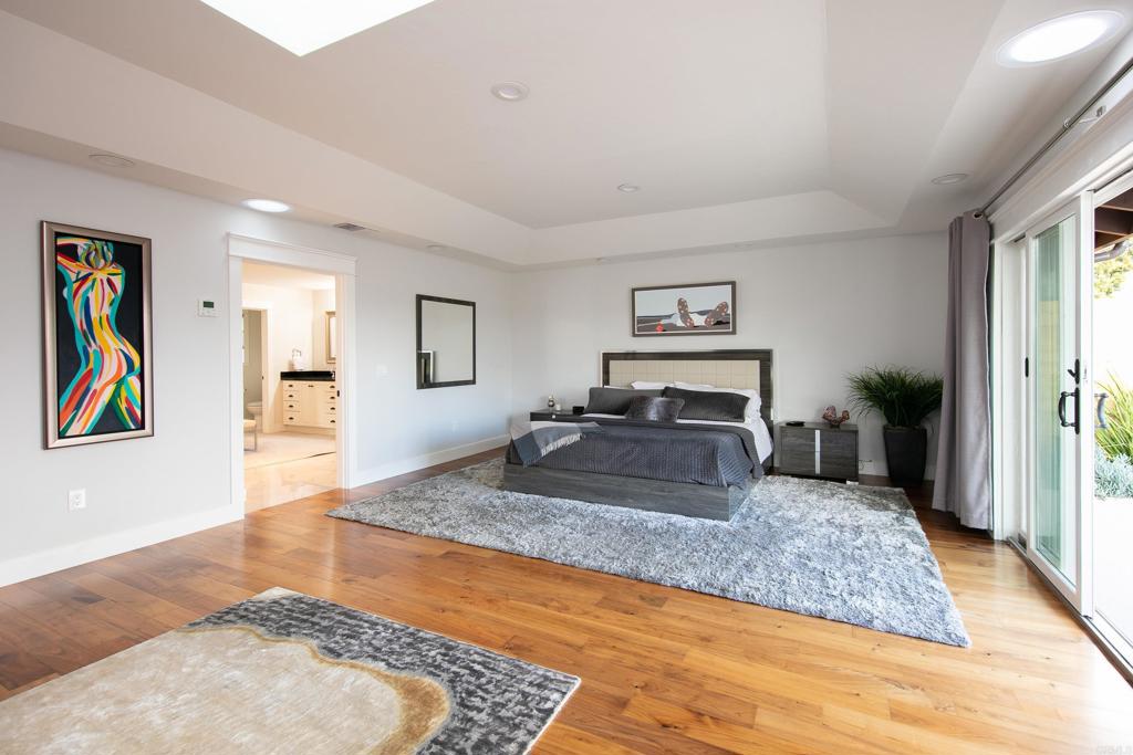 6145 La Flecha, Unit 4 Rancho Santa Fe, CA 92067 - Photo 16 of 26 a living room with furniture and a fireplace