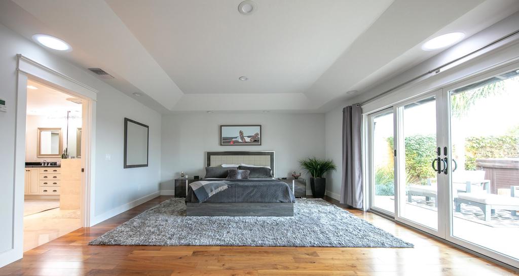 6145 La Flecha, Unit 4 Rancho Santa Fe, CA 92067 - Photo 21 of 26 a living room with furniture and a rug