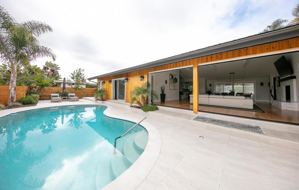 6145 La Flecha, Unit 4 Rancho Santa Fe, CA 92067 - Photo 23 of 26 a view of a patio with swimming pool