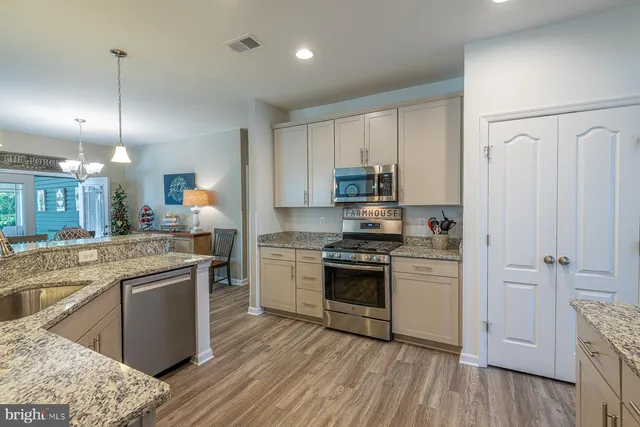 a room with a sink and a mirror